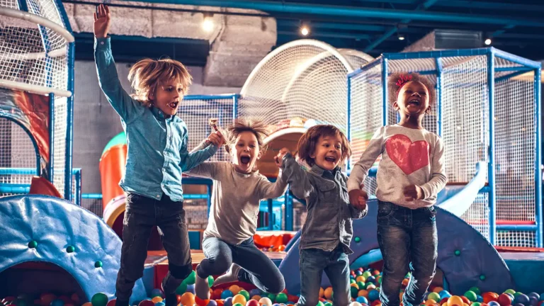 Indoor activities Greenville, SC: Children having fun in an indoor playground ball pit